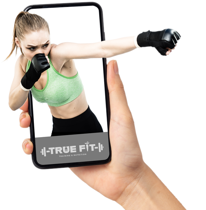 True Fit Training and Nutrition app promotional photo of a female boxer coming out of a phone